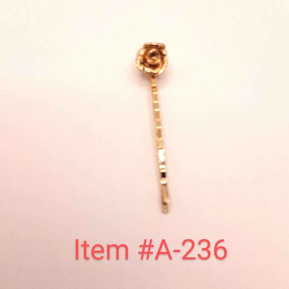 A Gold Flower Hair Pin Clip, Item # A-236. wt .3grams.